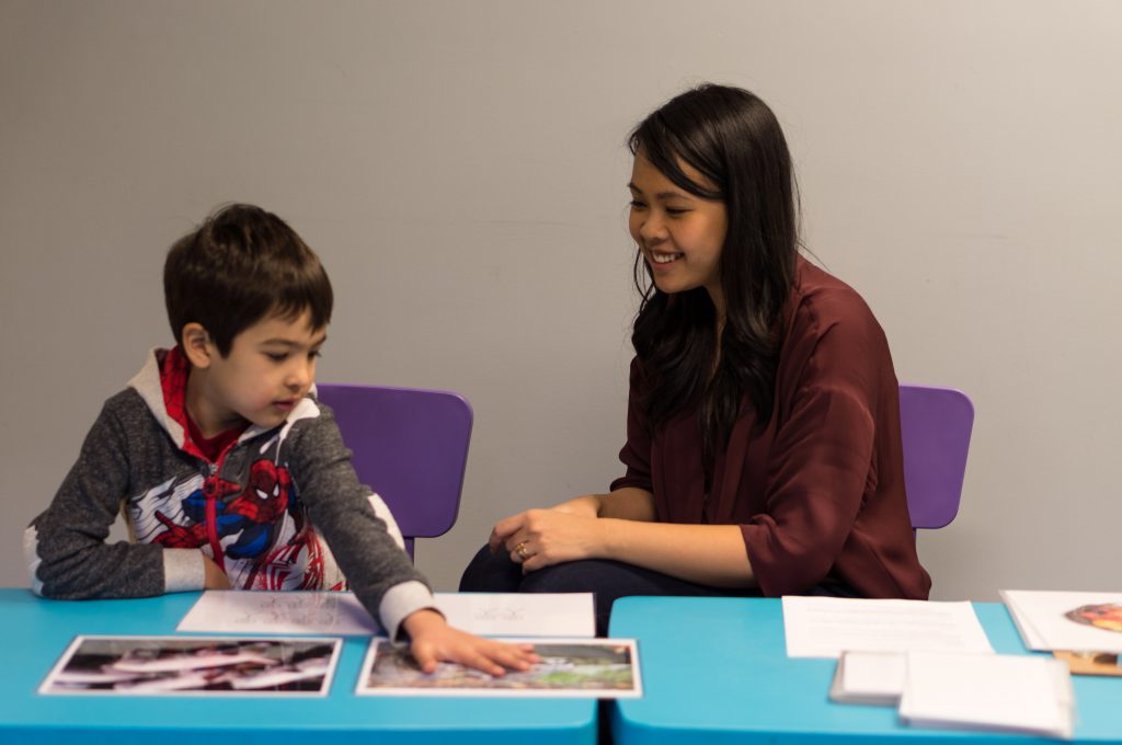 A child taking part in a K.I.D. Studies Centre experiment