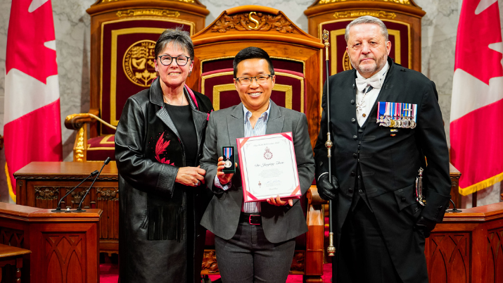 L-R: Senator Kim Pate, Dr. Jiaying Zhao, and Greg Peters, Usher of the Black Rod.